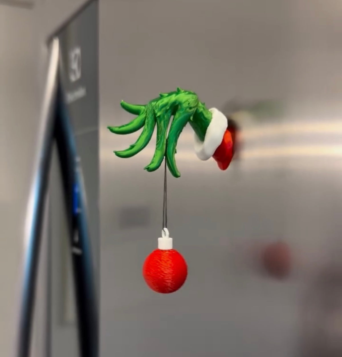 Grinch hand ornament holder
