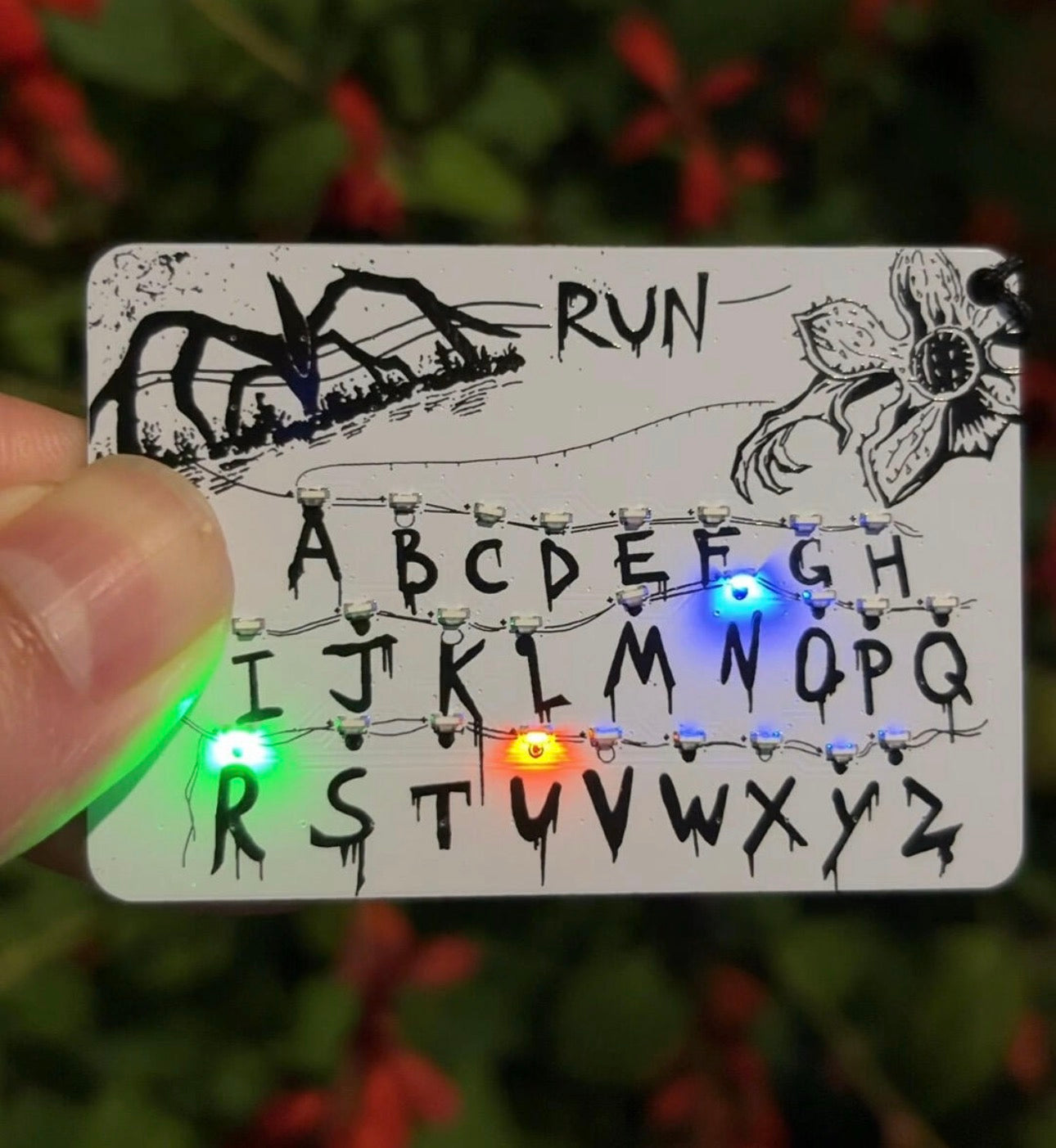 Stranger Things Run Card Keychain