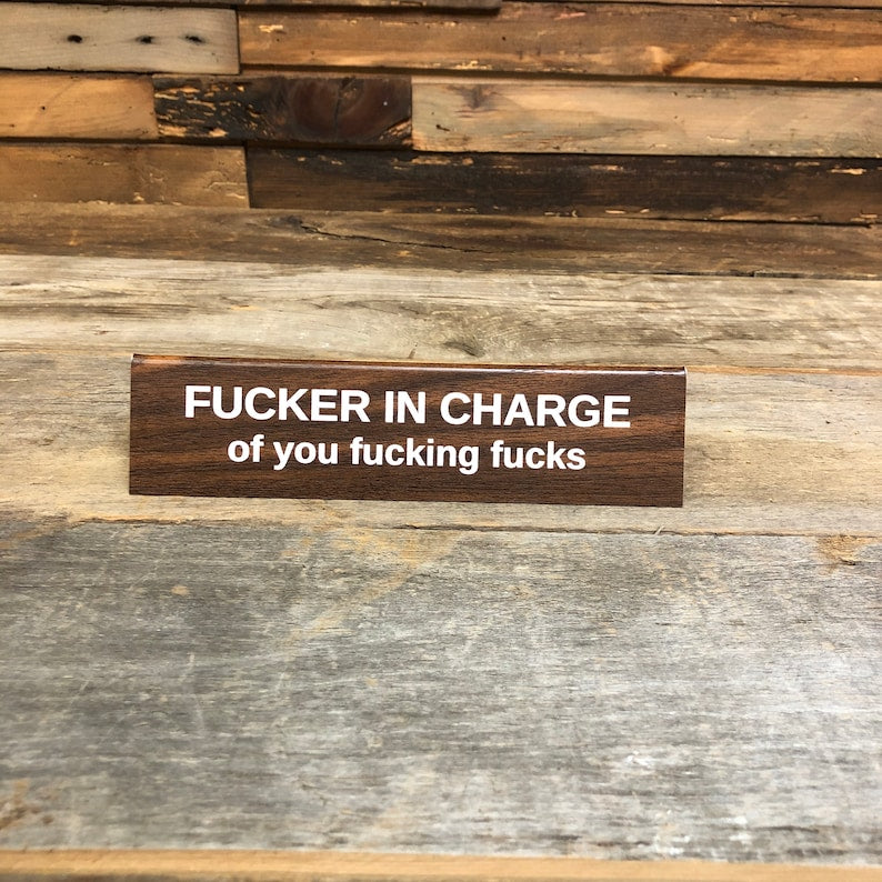 FUCKER IN CHARGE Sign