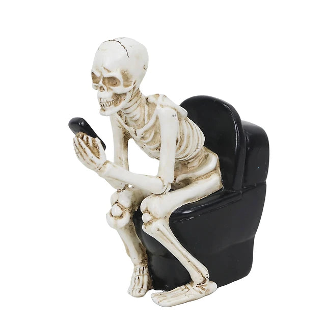 Mini Skeleton on Toilet