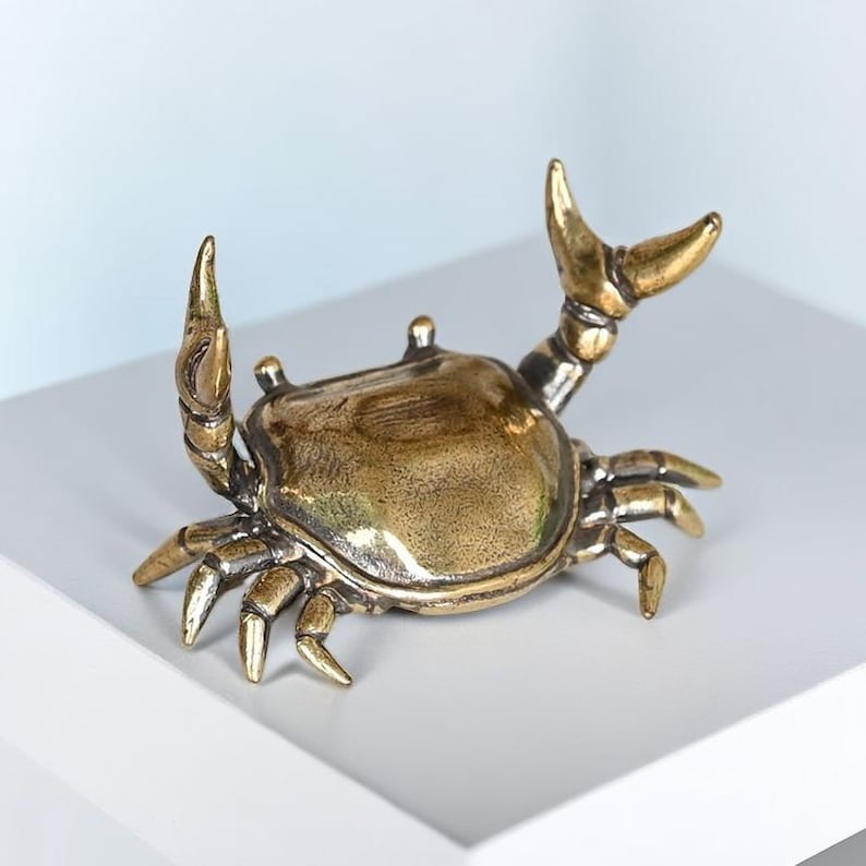 Brass weightlifting crab